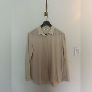 Cream long sleeve shirt
